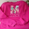 Sudadera Fucsia Con Inicial Flor Alegre
